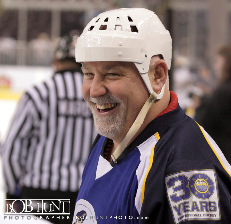 Peoria Rivermen hall of famer and honary captain Bob "The Hammer" Fleming on the bench before the alumni game