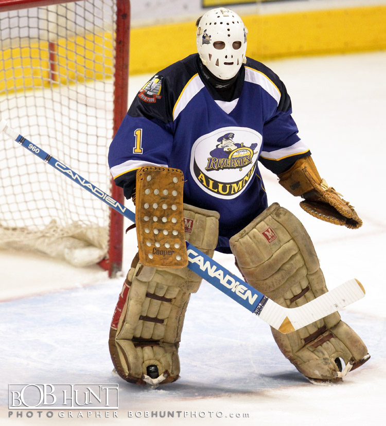 A former Rivermen goal keeper in goal for the alumni game at Carver Arena